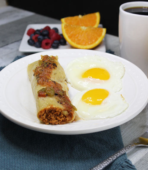 Chicken Tamale with Sunny Side up Eggs